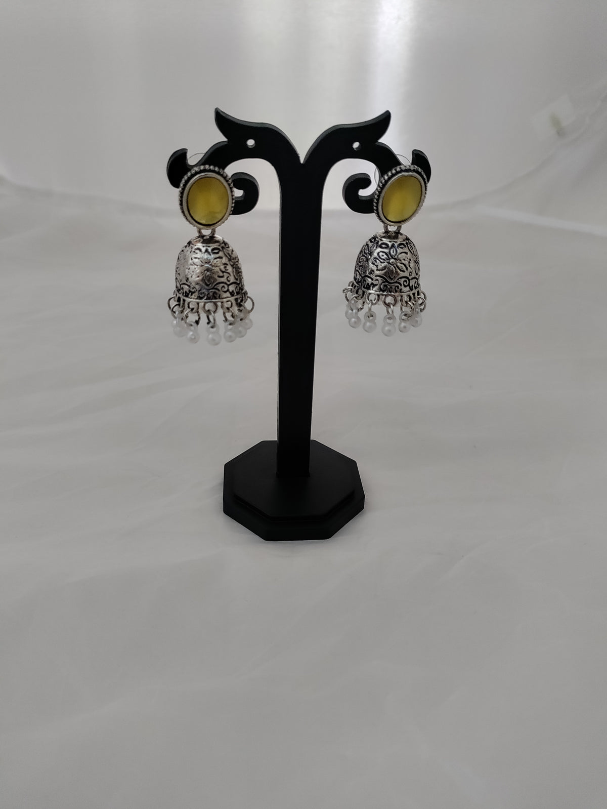 Silver jhumkas with beautiful yellow stone