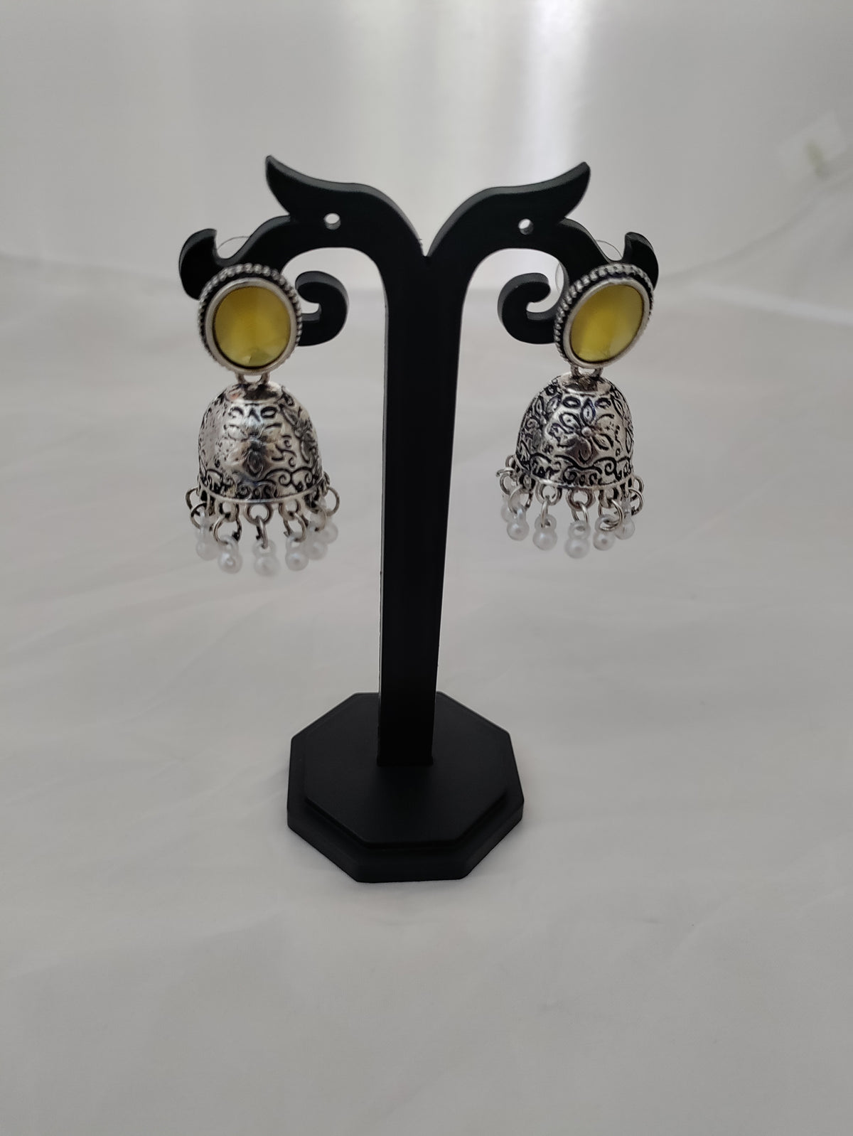 Silver jhumkas with beautiful yellow stone