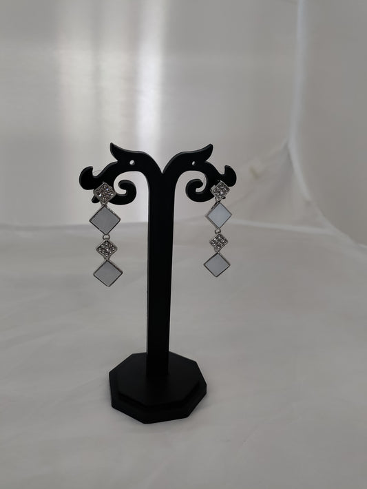 White and silver trendy earrings
