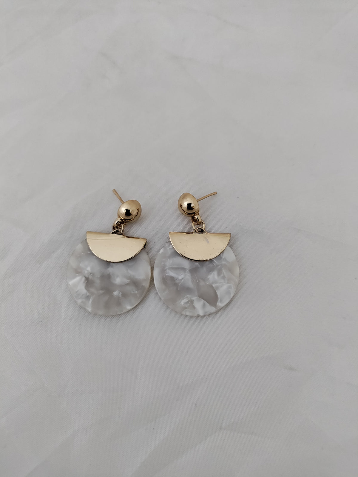 White and gold trendy earrings